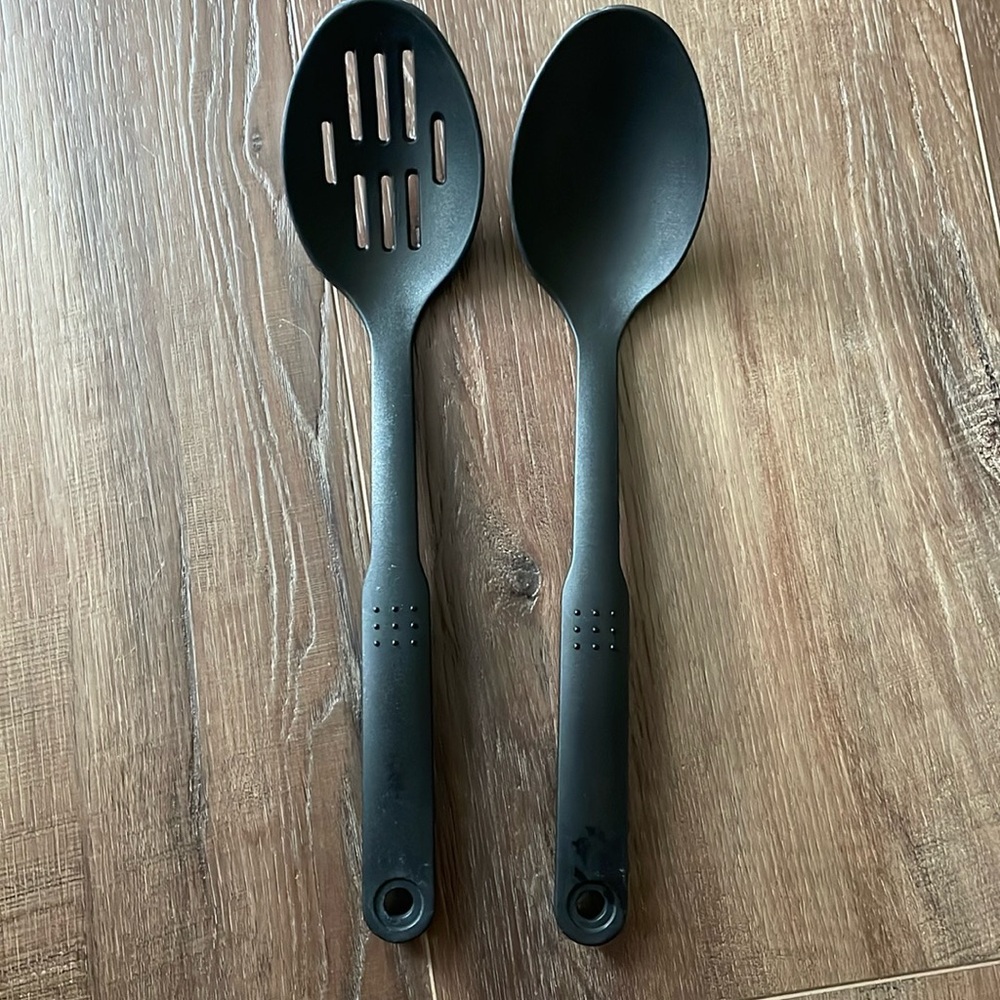 Two Large black plastic cooking utensils